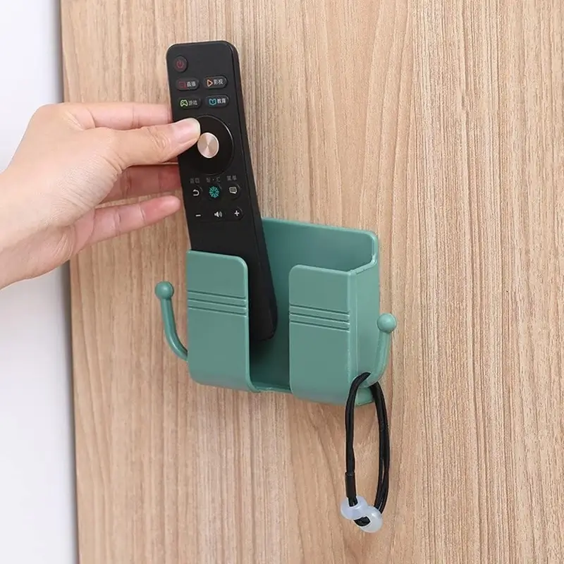 Multifunctional Wall-Mounted Remote Control And Mobile Phone Organizer Multifunctional Wall-Mounted Remote Control And Mobile Phone Organizer